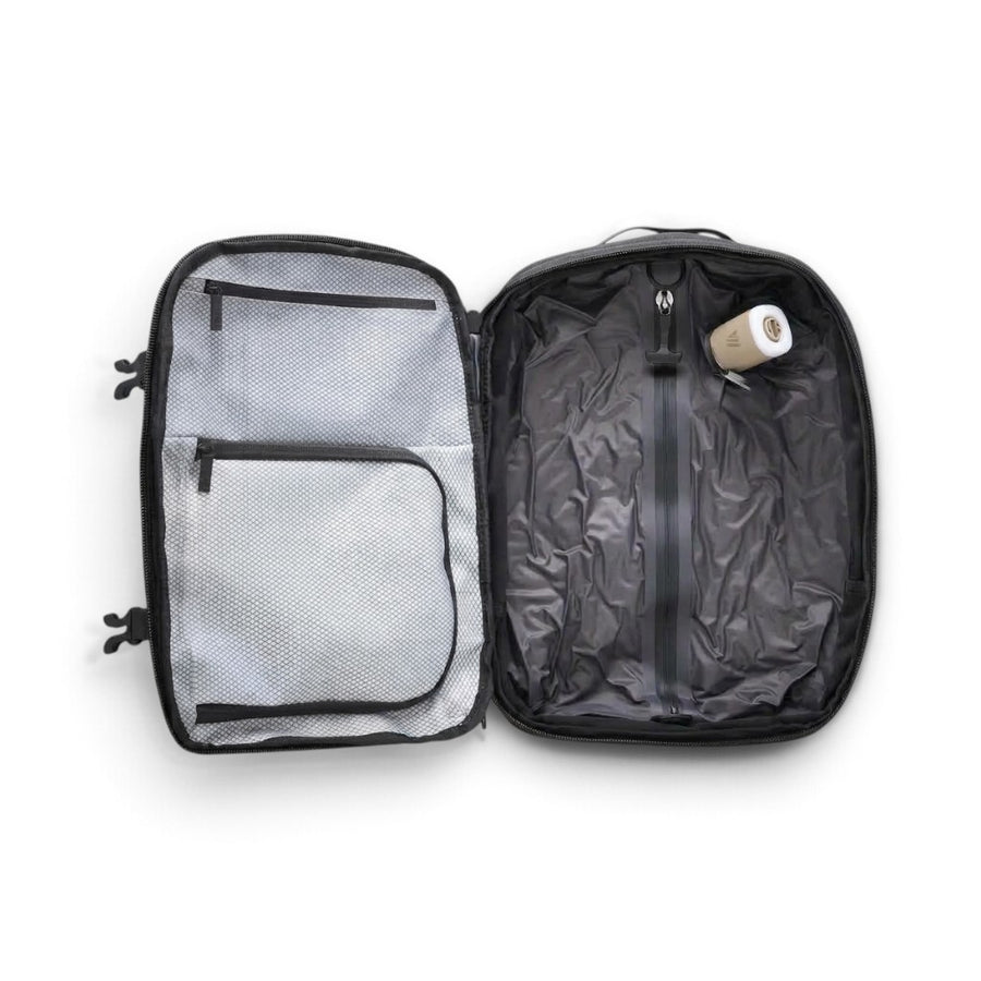 Compression sous vide intégrée — Transit 32L — Sac à dos sous le siège