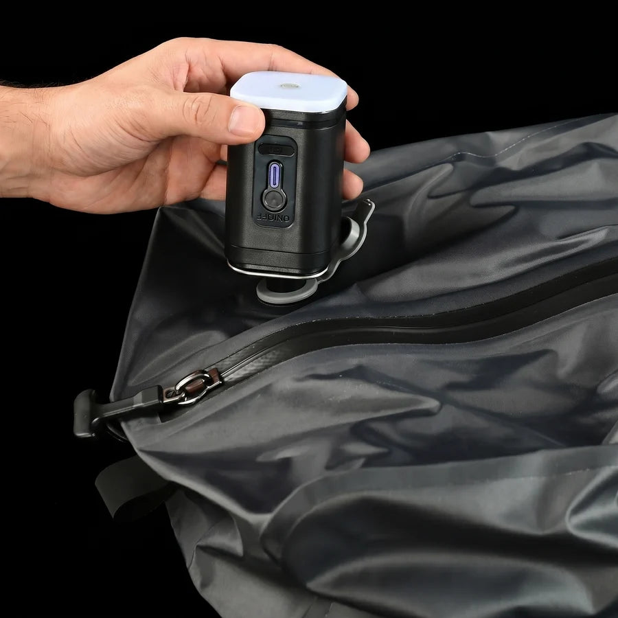 Compression sous vide intégrée — Cap 48L — Sac à dos sous le siège